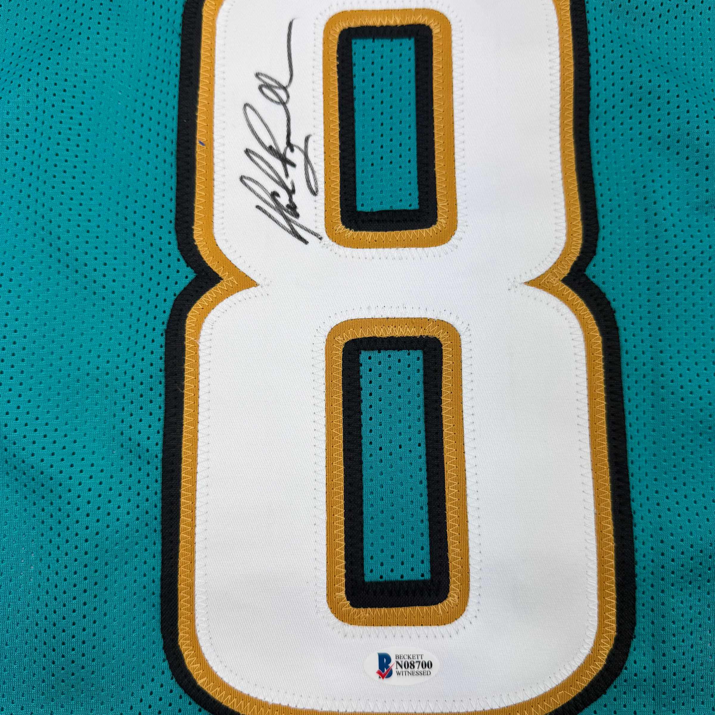 Autographed/Signed Mark Brunell Jacksonville Teal Football Jersey Beckett BAS COA - Image 3