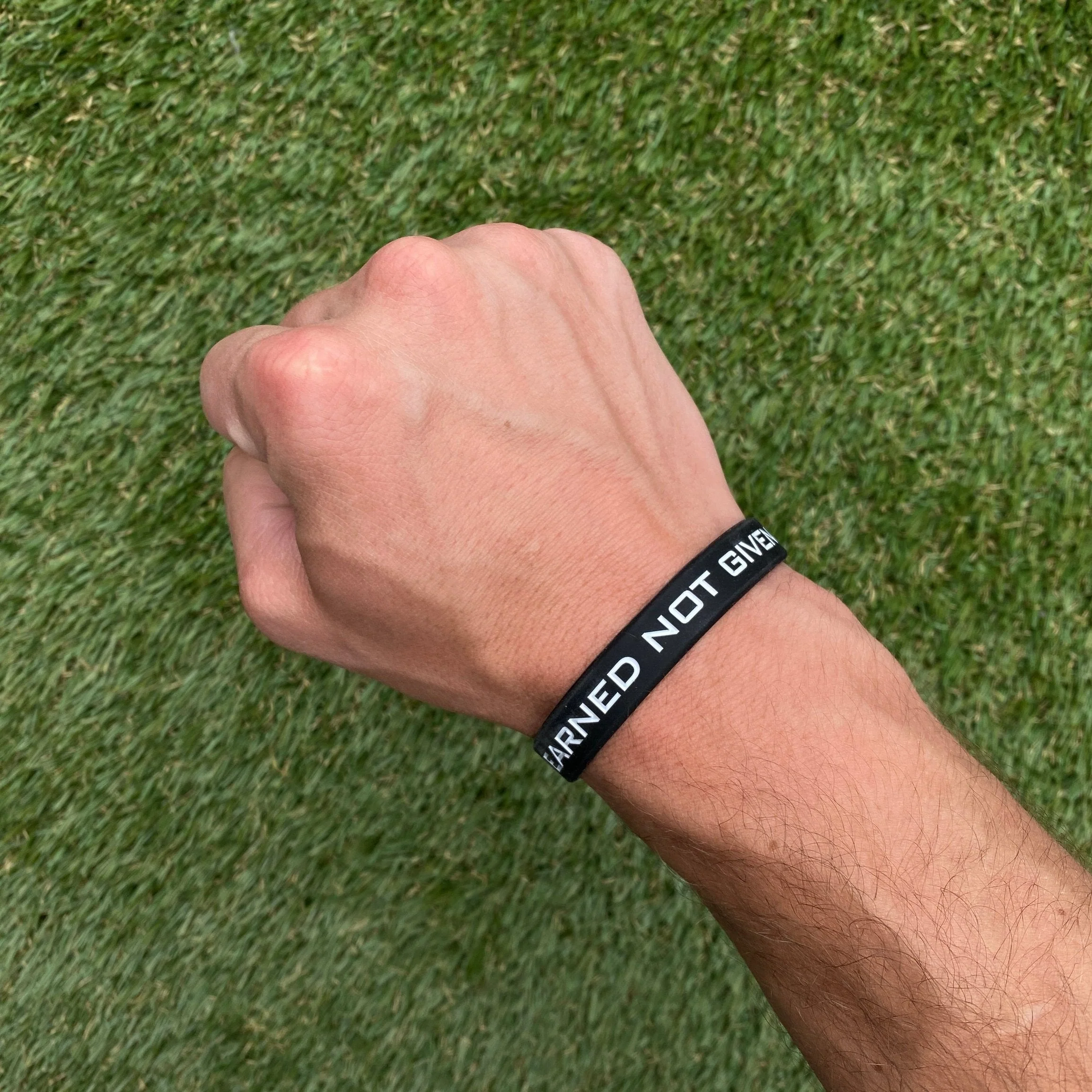 EARNED NOT GIVEN Wristband - Image 2